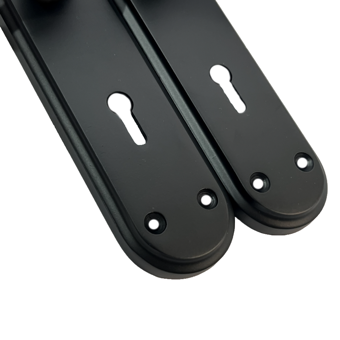 Genova Door Handles Matt Black Twist Lever Lock on Modern Marina Backplate