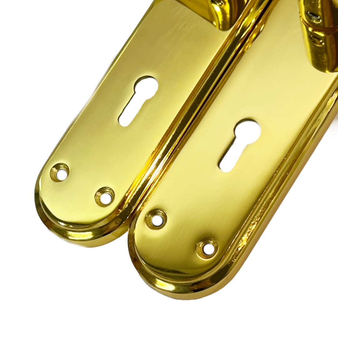 Genova Door Handles Polished Brass Twist Lever Lock on Modern Marina Backplate