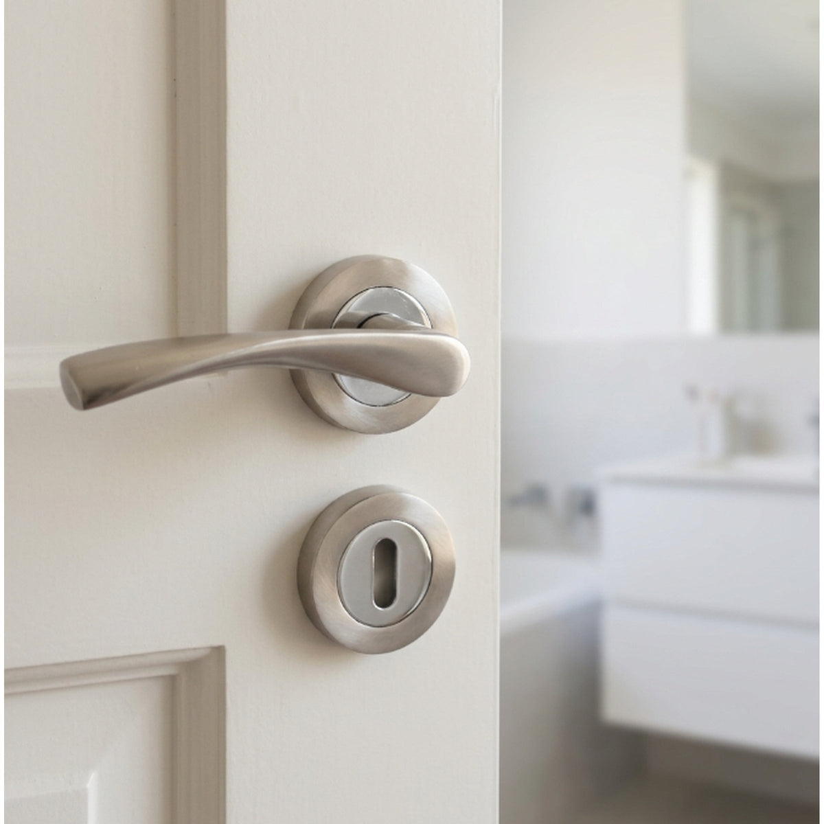 Marketplace JPG companion for Astrid Door Handles Lock and Key Escutcheon Twist Lever on Rose - Satin Chrome 120mm