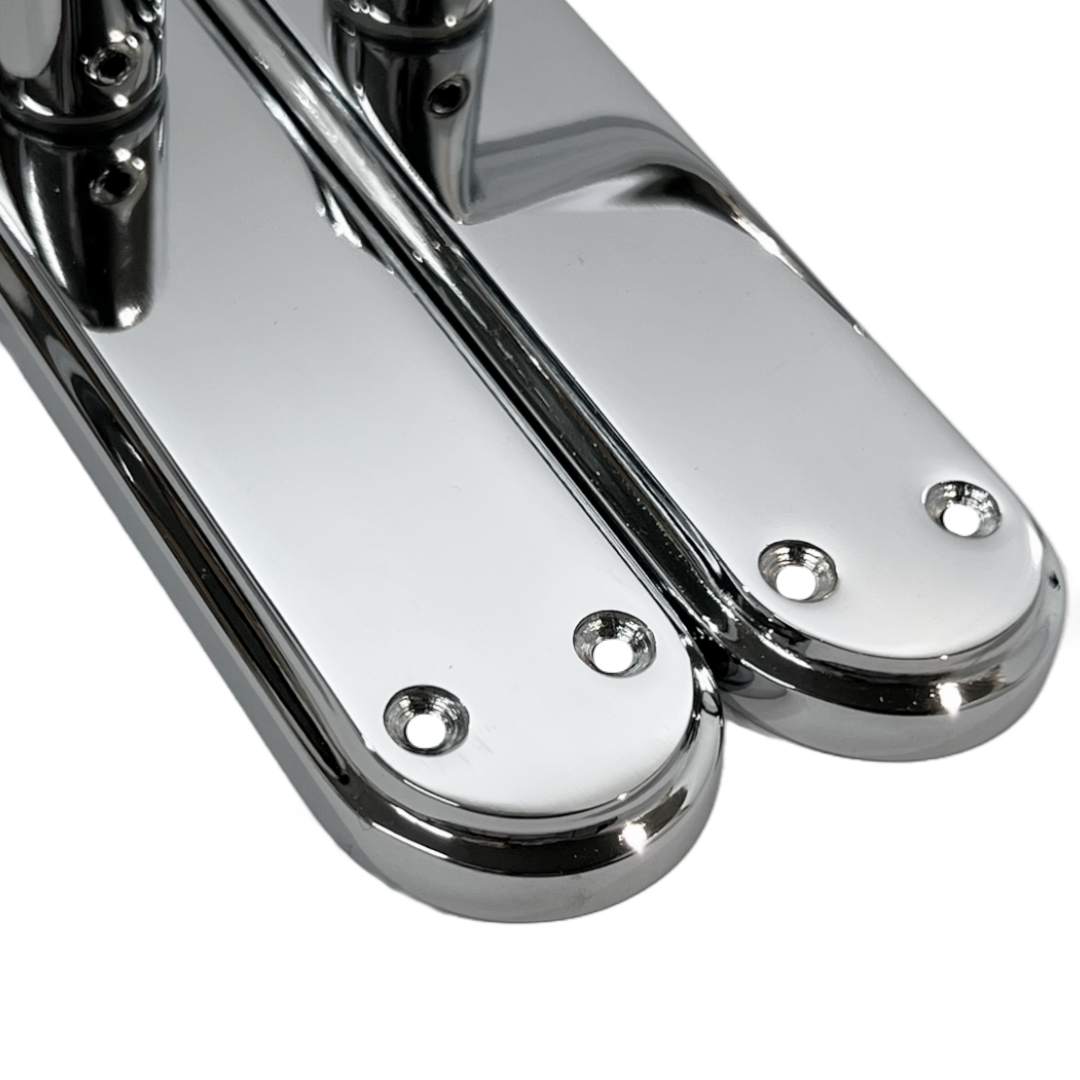 Genova Door Handles Polished Chrome Twist Lever Latch on Modern Marina Backplate