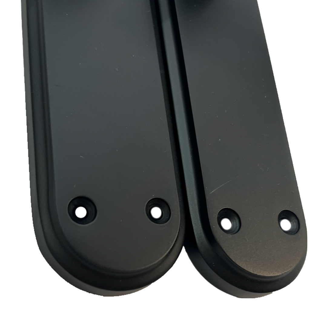 Genova Door Handles Matt Black Twist Lever Latch on Modern Marina Backplate