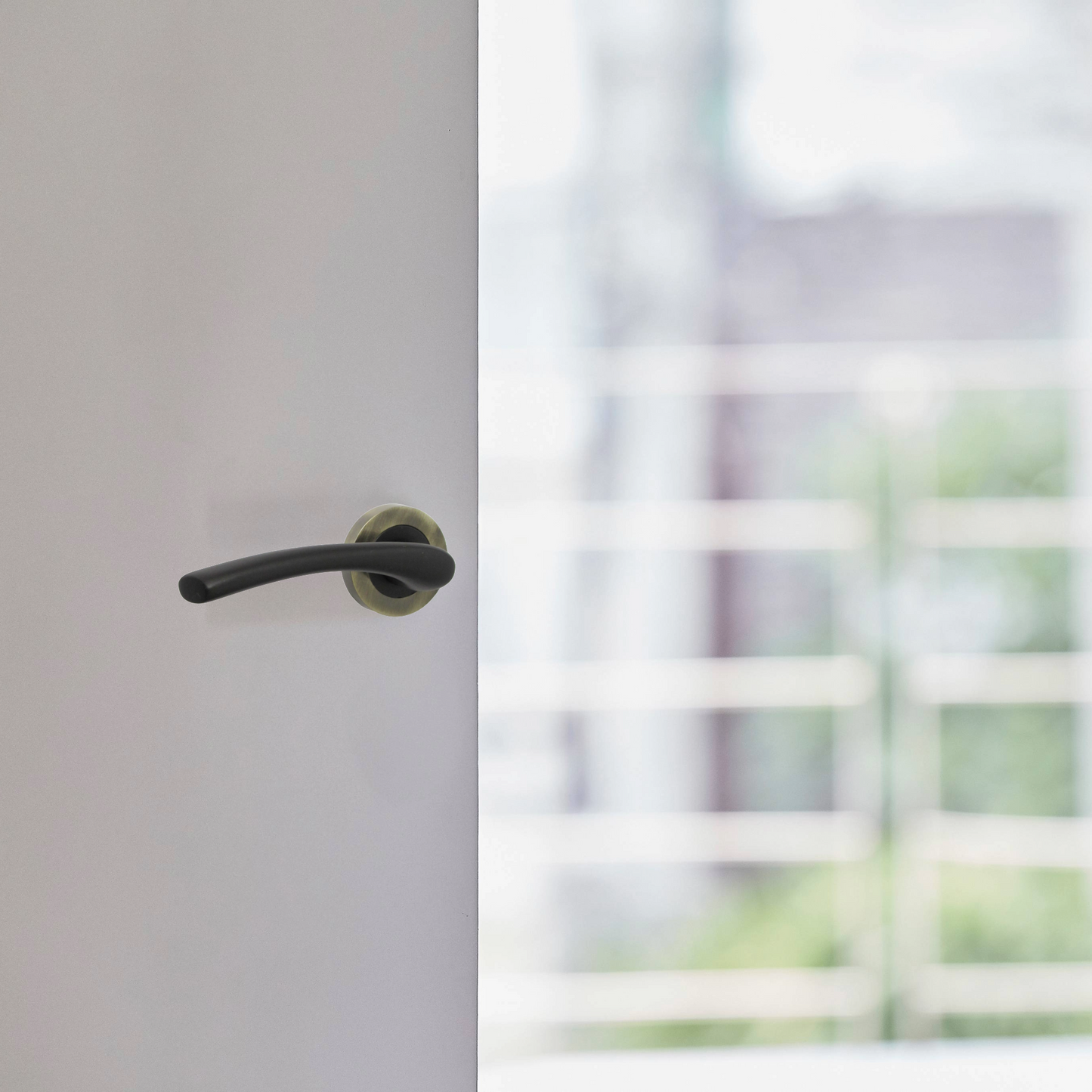 Zena Door Handle Modern Design Matt Black Lever on Antique Rose Internal Latch Handles