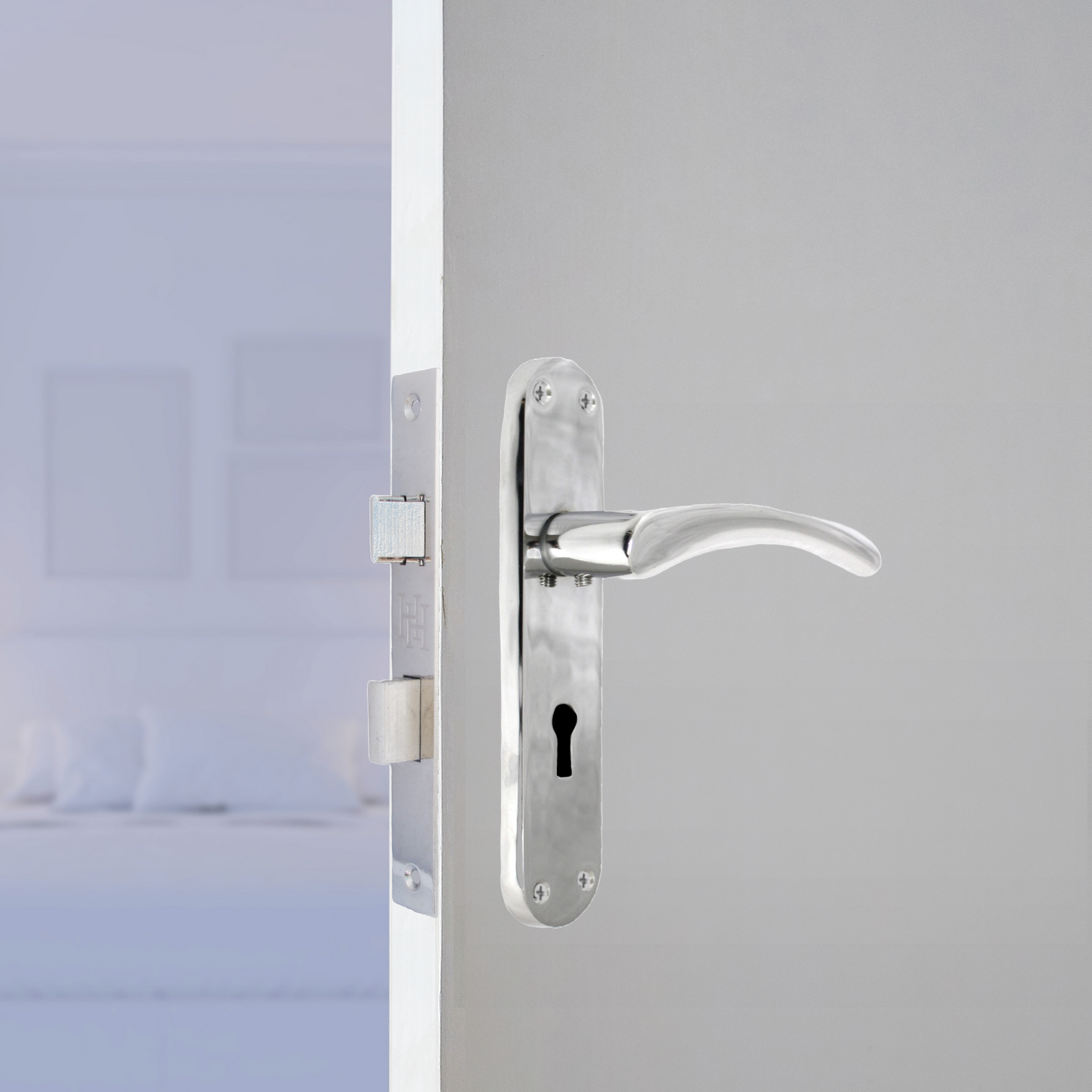 Monja Astrid Door Handles Arched Lever Polished Chrome Key Lock